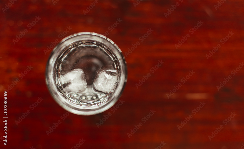 Glass of ice water on the table