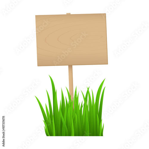 Empty wooden sign with fresh green grass isolated on white background with copy space for your text.