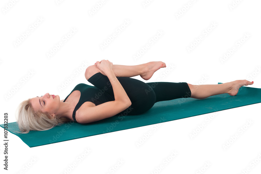 Woman practicing yoga Woman practicing yoga