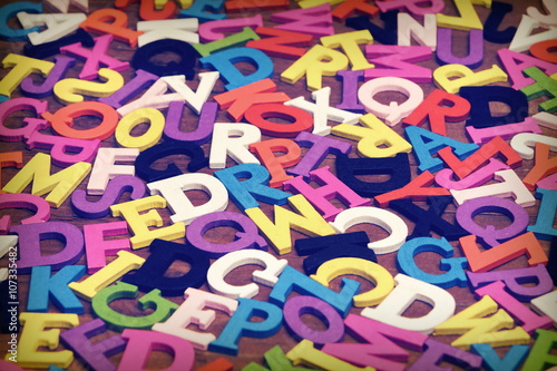 English Wooden Colorful Letters On The Brown Wood Background