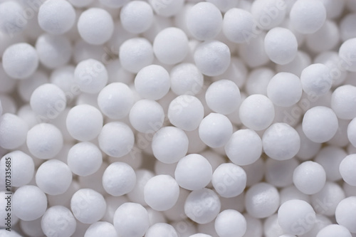 Spherical homeopathic pills closeup photo