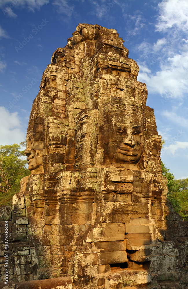 Giant stone faces at Bayon Temple in Cambodia