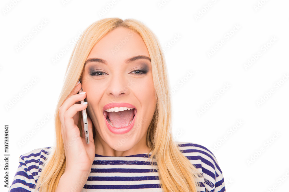 Close up portrait of young excited woman talking on phone Close up portrait of young excited woman talking on phone