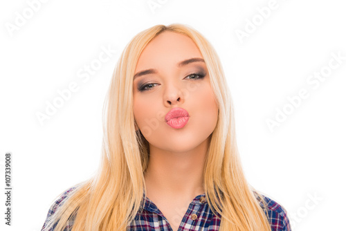 Close up portrait of beautiful pretty young woman pouting