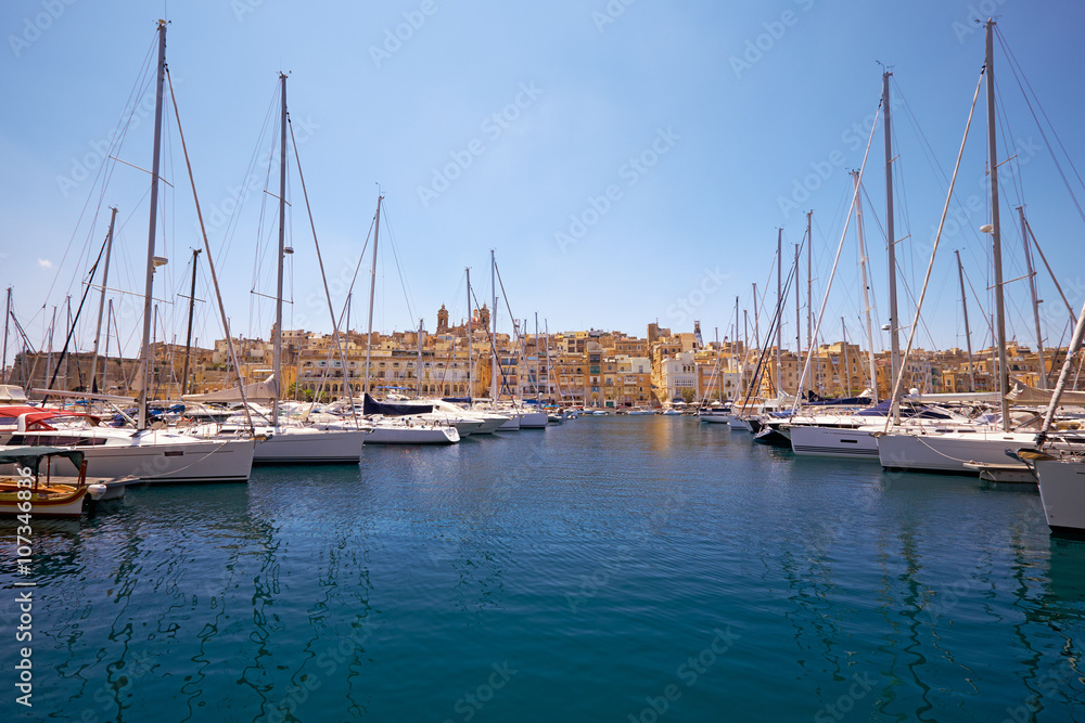 The view of yachts moored in harbor in Dockyard creek with Sengl