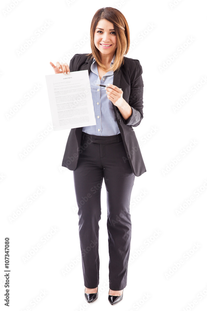 Female lawyer showing up a contract Female lawyer showing up a contract