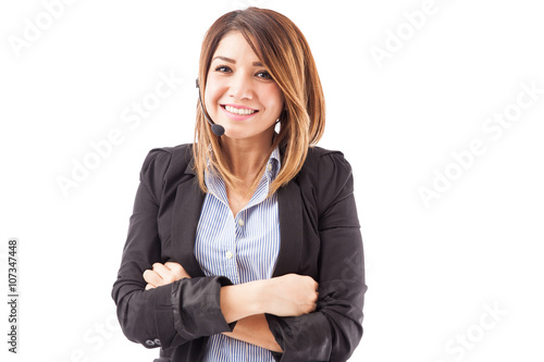Fotografie Beautiful Hispanic telemarketer with headset