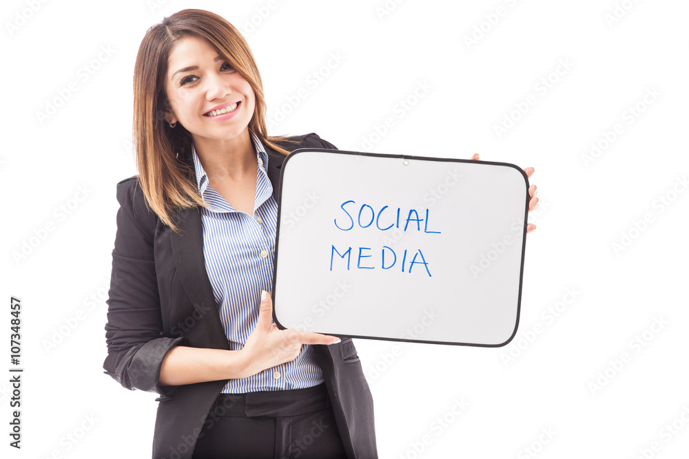 Happy businesswoman with text SOCIAL MEDIA Happy businesswoman with text SOCIAL MEDIA