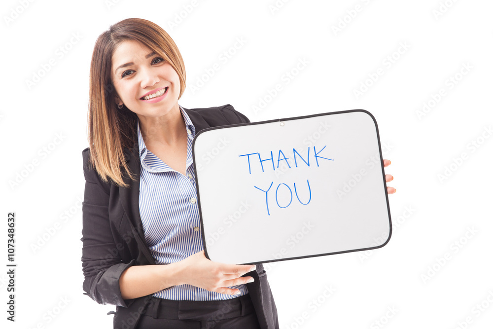 Pretty businesswoman with a THANK YOU sign Pretty businesswoman with a THANK YOU sign
