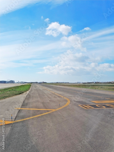 Airport runway in the sun