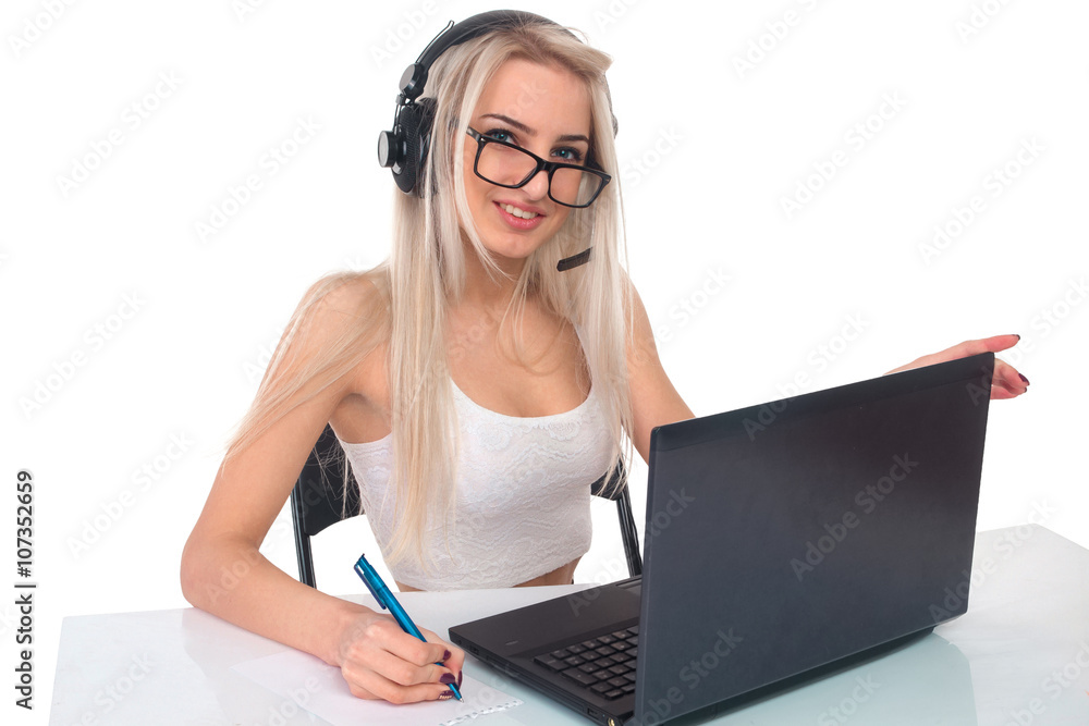 The girl in headphones with laptop The girl in headphones with laptop