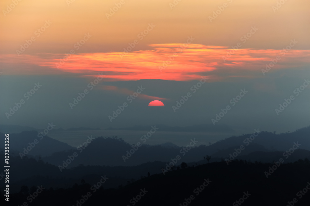 Landscape of dawn coming in top of mountain.