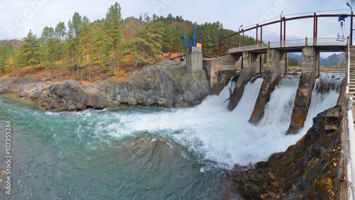 The old hydroelectric power station on the river Chemal after a flood in mountain Altai in Russia