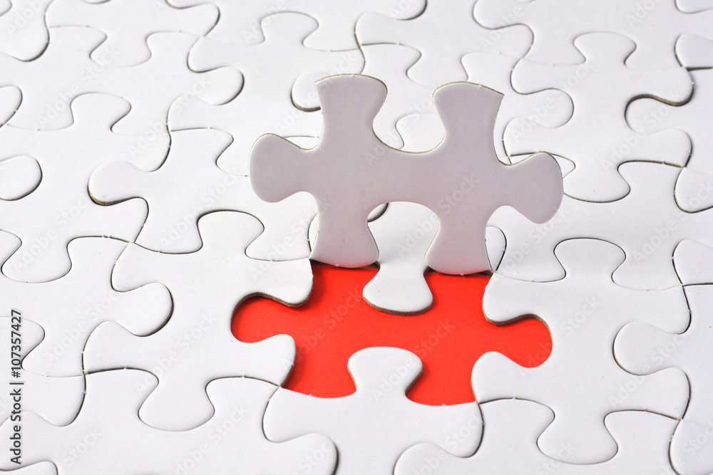 Puzzle on red background. Team business concept Puzzle on red background. Team business concept