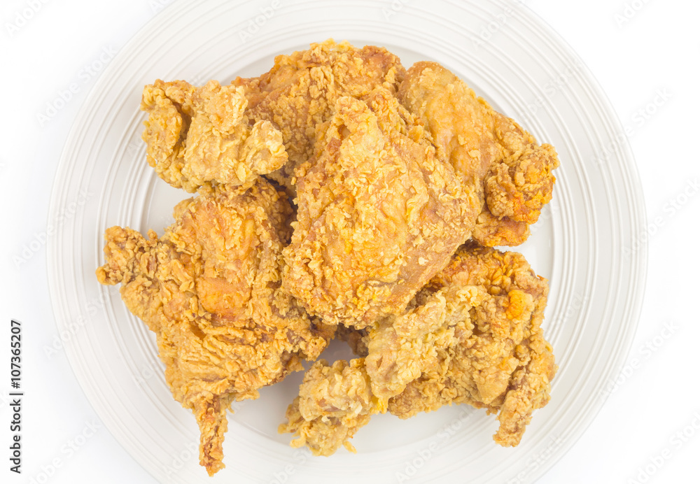 Fried chicken in white plate,top view on isolate Fried chicken in white plate,top view on isolate