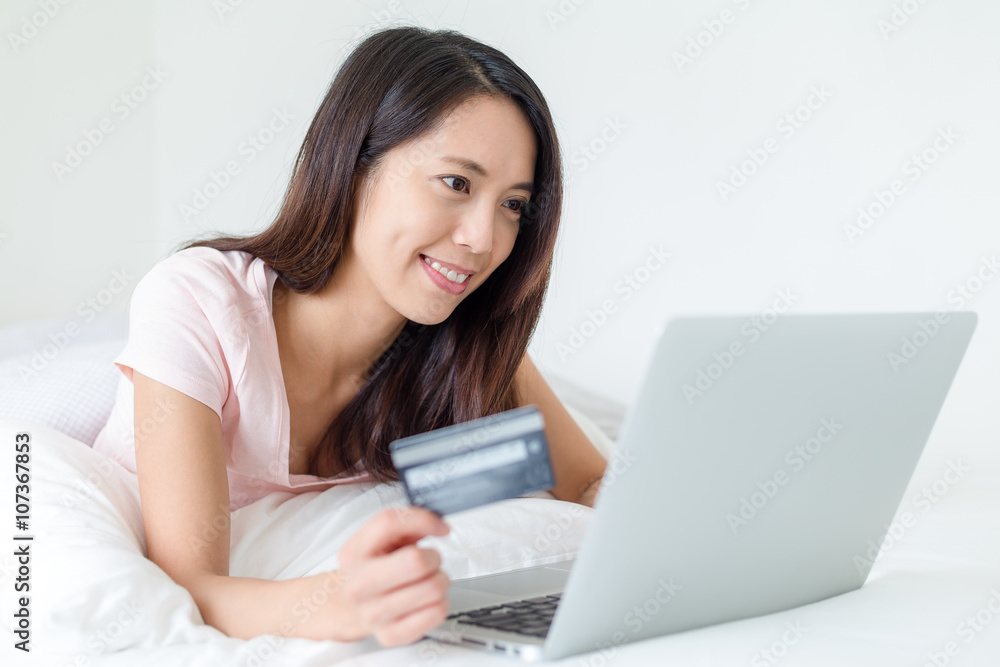Woman using laptop computer for online shopping Woman using laptop computer for online shopping