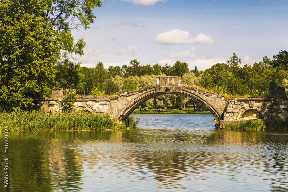 View of Humpback bridge on White lake. Gatchina Palace Park View of Humpback bridge on White lake. Gatchina Palace Park