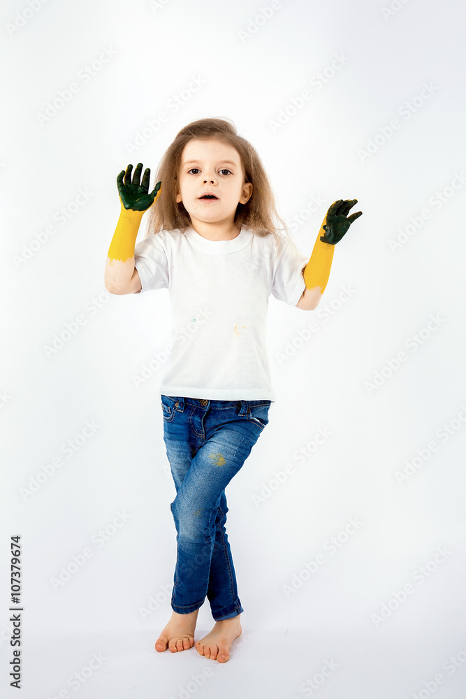Adorable little girl, modern hair style, white shirt, blue jeans poses,  scream, roar, smile. She has paint smeared on her hands. Isolated. White.  Stock Photo | Adobe Stock