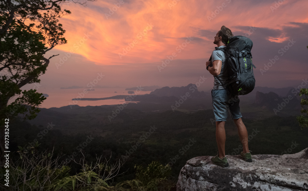 Fototapeta premium Hiker on top of a mountain