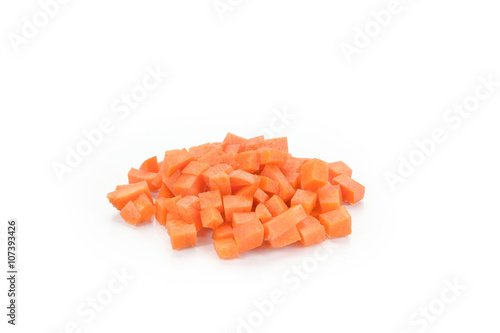 diced carrots on white background.
