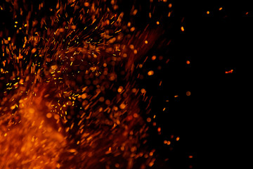 fire flames with sparks on a black background