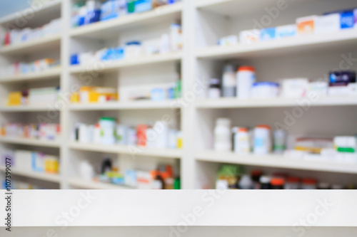 pharmacy product display counter with drugstore shelves