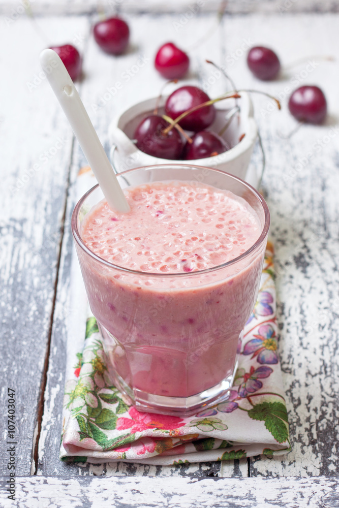 smoothie with cherry in a glass smoothie with cherry in a glass