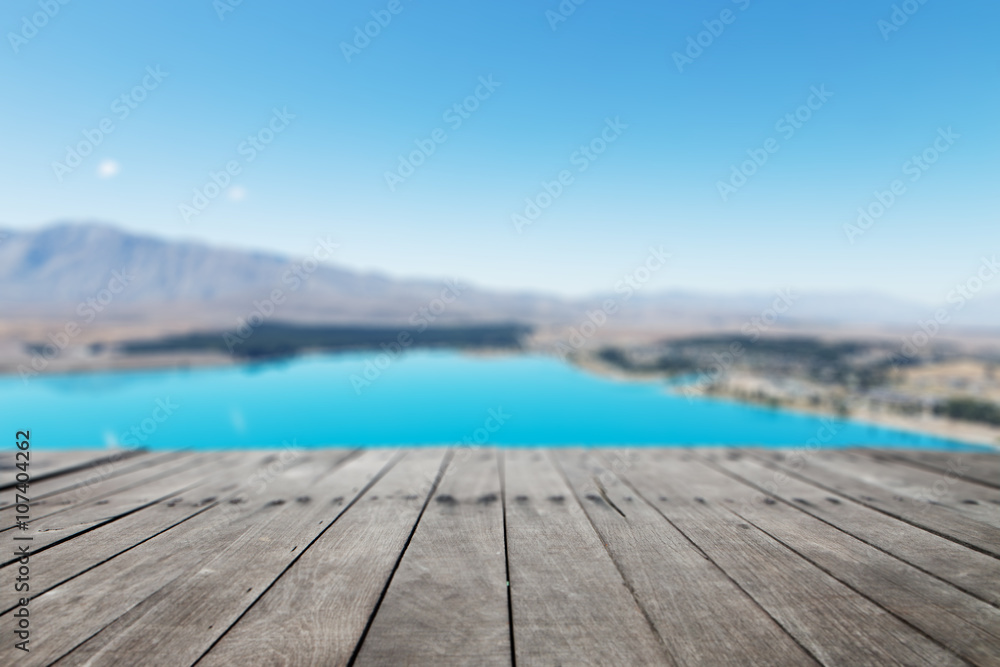 wood floor with landscape of lake in summer day in new zealand