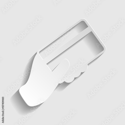 Hand holding a credit card