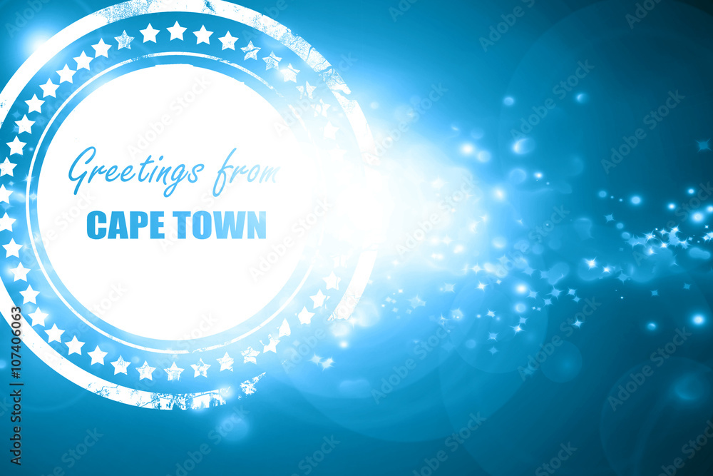 Blue stamp on a glittering background: Greetings from cape town