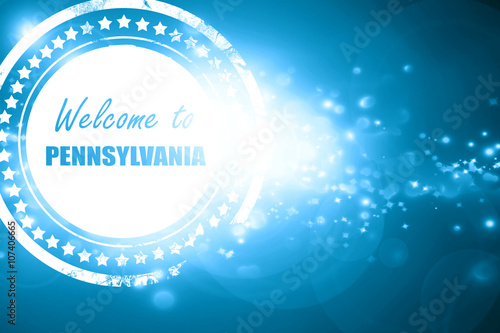 Blue stamp on a glittering background: Welcome to pennsylvania
