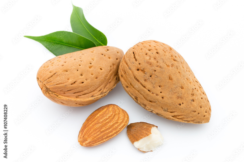 Almonds with leaves isolated on white background Almonds with leaves isolated on white background