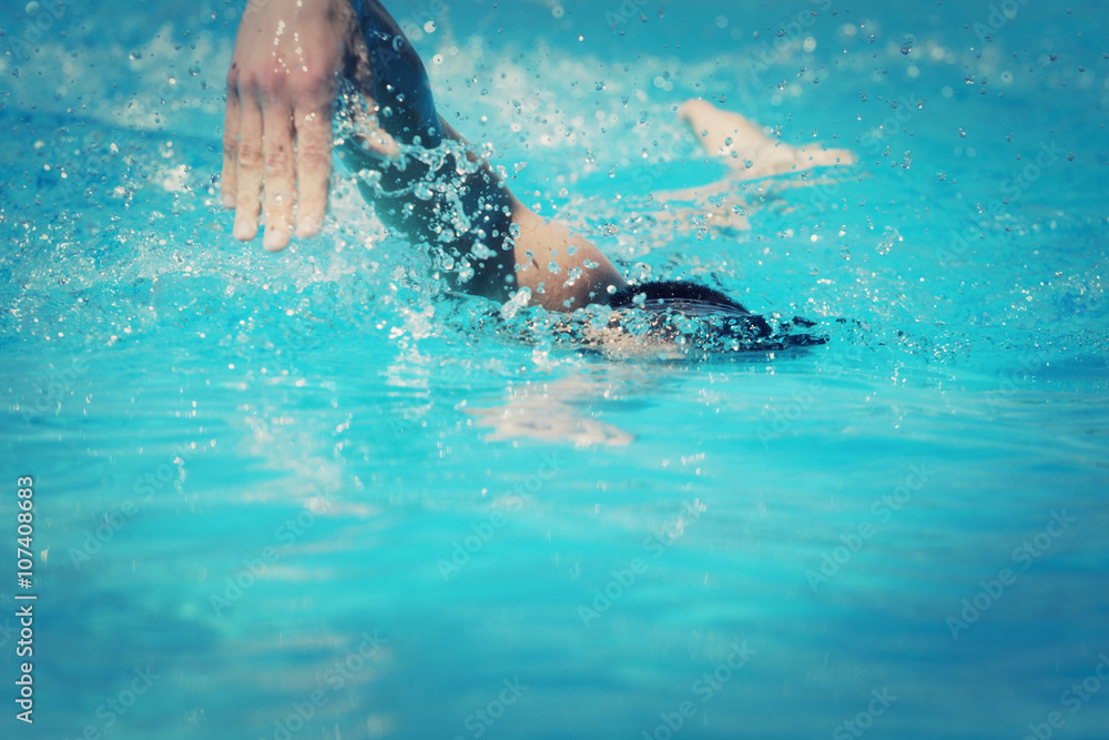 Sportsman swimming in a pool.
