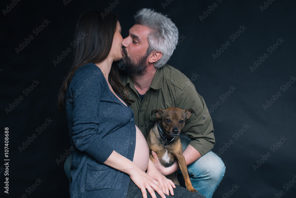 Couple posing with dog Couple posing with dog