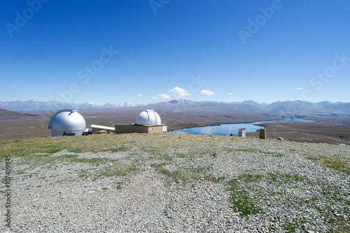 observatory on ground near lake in summer day in new zealand