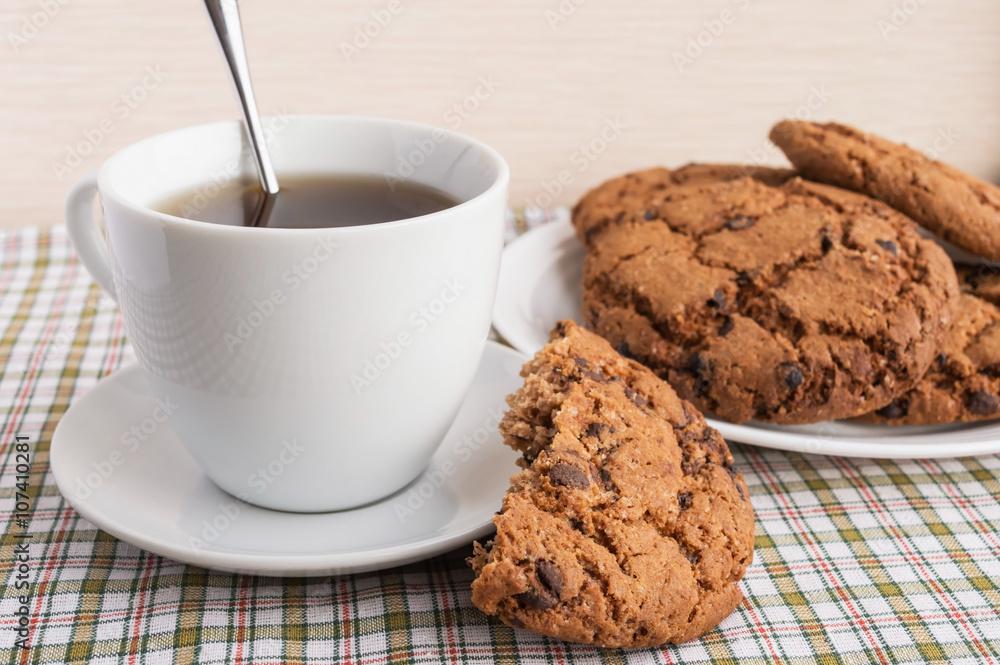 Cup of tea and cookies with chocolate Cup of tea and cookies with chocolate