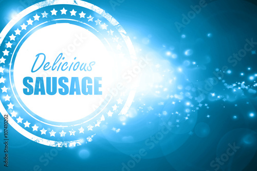 Blue stamp on a glittering background: Delicious sausage sign
