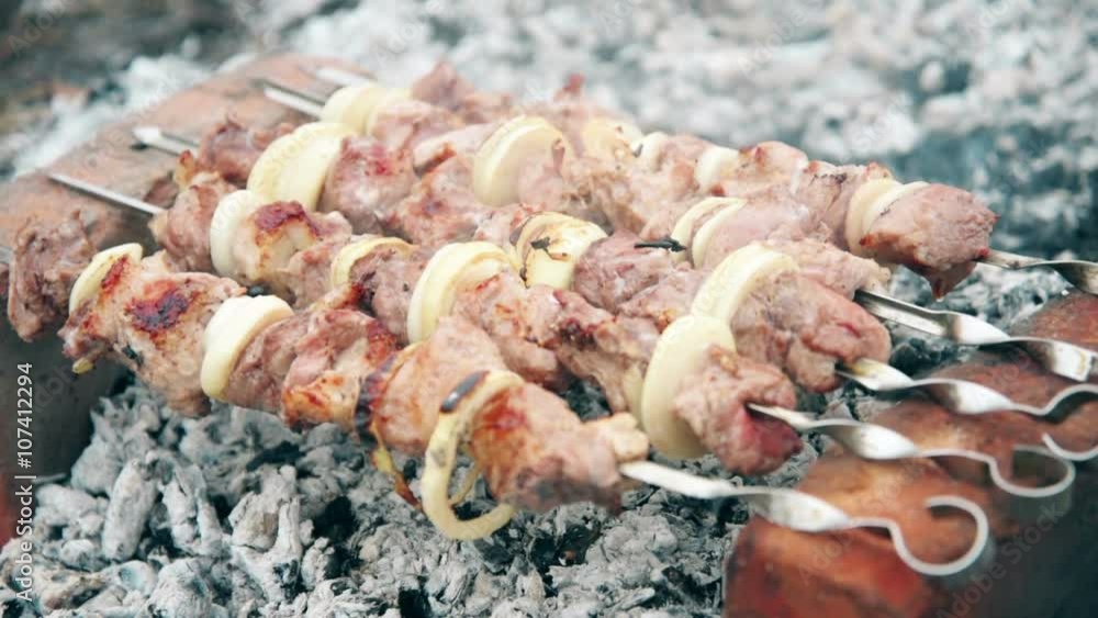 Barbecue grliling shish kebab on skewers Barbecue grliling shish kebab on skewers
