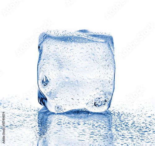 Melting ice cube close-up on a white background.
