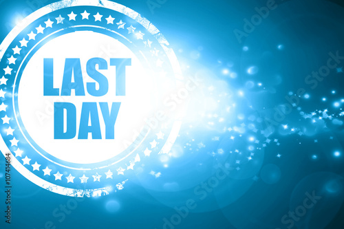 Blue stamp on a glittering background: last day