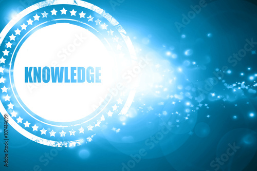 Blue stamp on a glittering background: knowledge