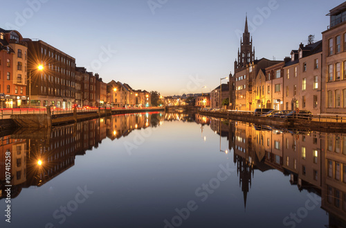 A View of the River Lee in Cork City, Ireland at Night. photo