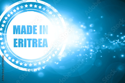 Blue stamp on a glittering background: Made in eritrea
