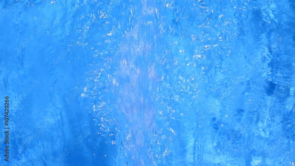 blue tiles swimming pool water jet motion surface blue tiles swimming pool water jet motion surface