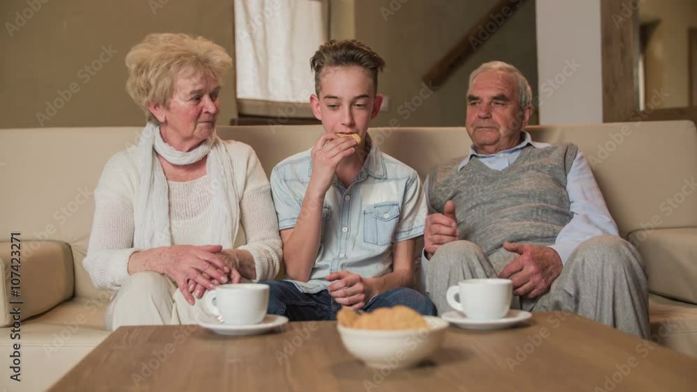 Grandson eat a biscuits at grandparents home Grandson eat a biscuits at grandparents home