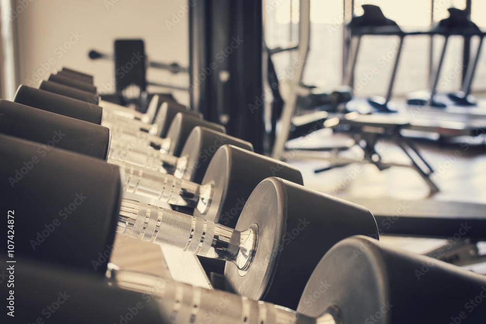 row of dumbbells in sport club, row of dumbbells in sport club,