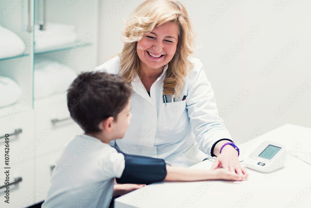 Fototapeta premium Pediatrics. Measuring blood pressure