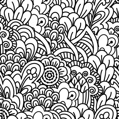 Seamless black and white background. Floral  ethnic  hand drawn elements for design. Good for coloring book for adults or design of wrapping and textile.