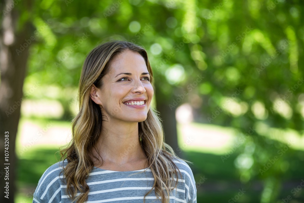 Portrait of a smiling woman in a park Portrait of a smiling woman in a park