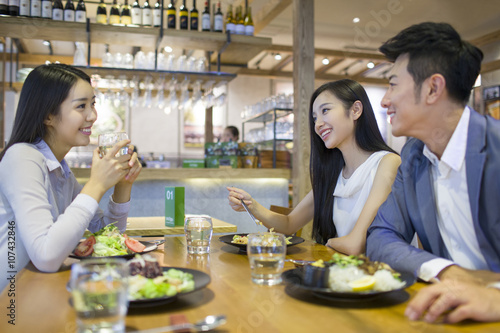 Friends having dinner together